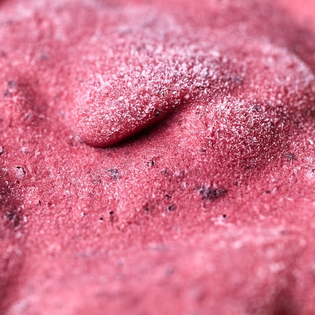 A close-up of skin showing signs of redness and irritation from over-exfoliation, with a peeling or flaky texture.