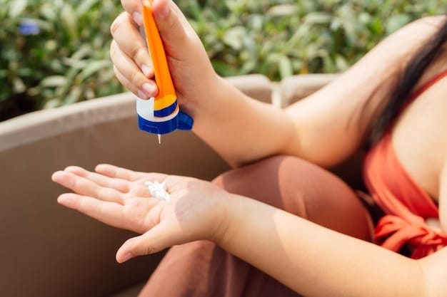 Hands applying a generous amount of sunscreen to an arm in a bright outdoor setting. The focus is on the smooth application and the protective layer the sunscreen provides against the sun.
