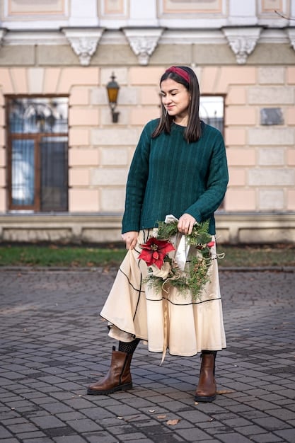 A meticulously styled outfit combining thrifted designer pieces - a vintage Chanel jacket paired with high-waisted Gucci jeans, accessorized with a unique, older designer belt. The outfit looks modern and fashionable.