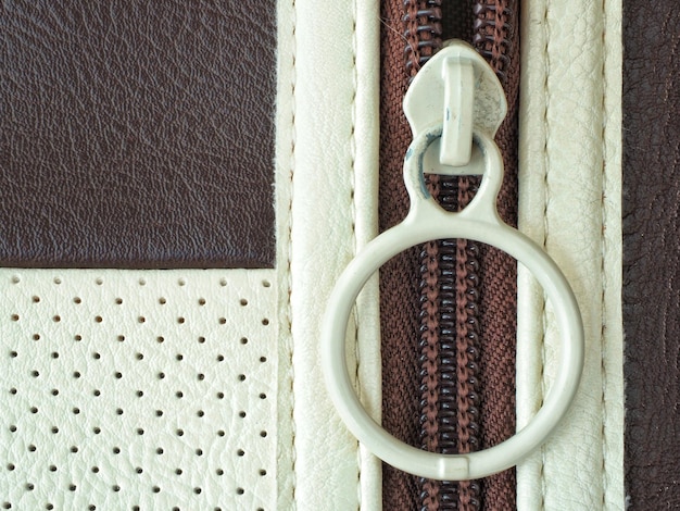 A split image comparing a genuine designer handbag (left) with a counterfeit version (right), highlighting the differences in stitching, logo placement, and hardware quality.