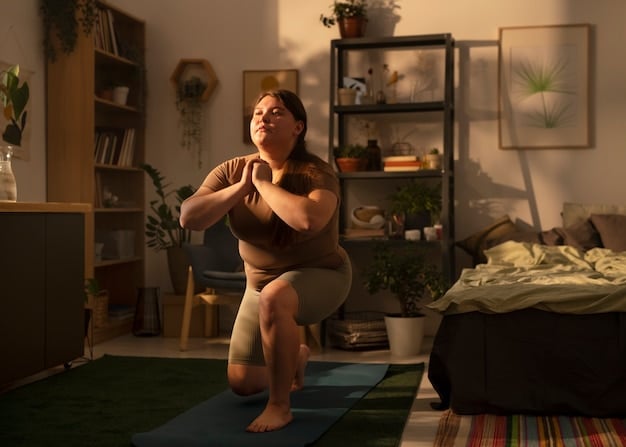 A person doing yoga at home, with natural light streaming in, symbolizing the importance of integrating mindful movement into a wellness routine.