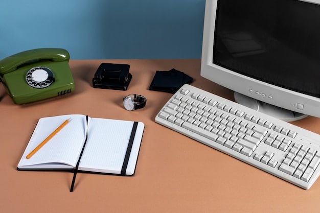 A desk setup with an ergonomic split keyboard and vertical mouse, promoting a neutral wrist posture. The setup includes a wrist rest, a well-placed monitor, and organized desk accessories.